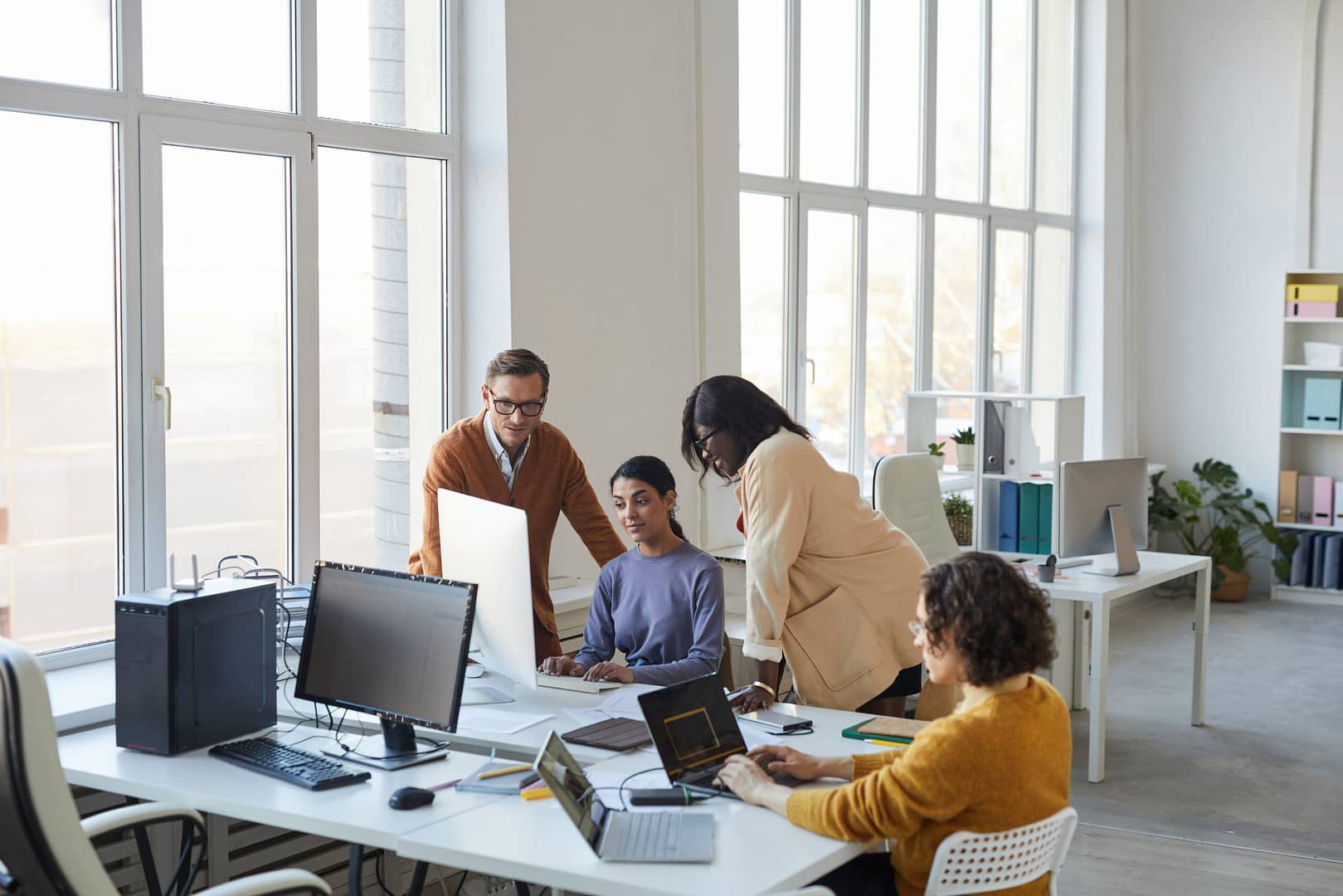 Team collaborating in a modern office environment
